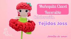 a crocheted doll sitting on top of a flower with the caption's name below it