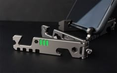 an image of a cell phone holder with green light on the front and back side