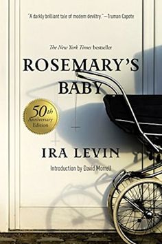 a baby buggy sitting in front of a white door with the words rosemary's baby written on it