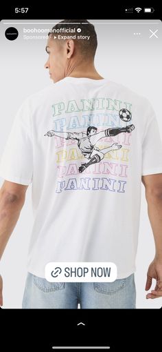 a man wearing a t - shirt with the words painless drawn on it