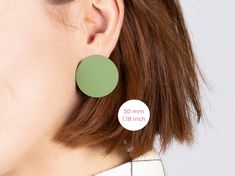 Looking for gifts for women to be sustainable gifts? Look at the statement earrings in the aesthetic jewelry section. Geometric earrings will fit great as girlfriend gift or sister gift! GREEN EARRINGS SPECIFICATION *Diameter - 30 mm *Thickness - 1 mm *All metal elements of the minimalist earrings - titanium zinc, coating - water-based acrylic lacquer The big earrings are lovingly and reliably packed and sent to you within 1-2 working days after payment. Want to find MORE trendy EARRINGS in stai Modern Green Earrings, Modern Green Earrings As Gift, Modern Green Round Earrings, Artsy Gifts, Red Earrings Stud, Artsy Gift, Unique Studs, Large Statement Earrings, Mother Daughter Gifts