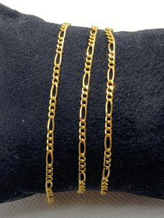 18kGold 2.42gr 19.5 inches 2mm18kGold 2.00gr 19.5 inches 1.5mm18kGold 1.52gr  19.5 inches 1 mm18kGold 2.20gr 17.7inches 2mmThe video clip belongs to 2mm necklace .18kGold 1.62gr  21.5 inches 1mm also available at $270 CAD please send message if interested .18kGold 2.20gr 17.7inches 2mm also available at $410 CAD please send message if interested .most of the photos here belongs to 2mm necklace .This is a Trending Etsy Bestselling FIGARO Necklace. It is made with Authentic Genuine Solid 18K Gold. Yellow Gold Figaro Chain Necklace For Anniversary, Yellow Gold Figaro Chain Necklace As A Gift, 14k Yellow Gold Figaro Chain Necklace, 14k Gold-filled Figaro Chain Necklace As Gift, 14k Gold-filled Figaro Chain Necklace, Figaro Necklace, Real Gold Chains, 18k Gold Chain, Gold Chains For Men