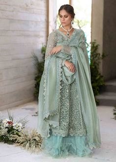 Designer Feather Lehenga Shirt for Indian Bridal Wear 2022 Formal Pista Green Sets With Chikankari Embroidery, Formal Green Salwar Kameez With Sheer Dupatta, Designer Organza Sharara For Transitional Seasons, Elegant Dabka Organza Lehenga, Elegant Dabka Embellished Organza Lehenga, Elegant Organza Lehenga With Dabka Details, Bollywood Style Lawn Suit With Sheer Dupatta For Reception, Formal Sharara With Sheer Dupatta For Eid, Formal Floor-length Sharara With Sheer Dupatta