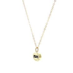 Our Run Charm Necklace is made for those who find joy in the miles, whether you’re a seasoned marathoner, triathlete, or someone who simply loves to run. Featuring a sleek charm available in brass with a gold-filled chain or sterling silver with a sterling silver chain, this necklace celebrates your passion for the sport. The reversible design adds versatility, and you can personalize it further by adding crystal charms for a touch of individuality. Wear it proudly as a reminder of your strength, perseverance, and the miles you've conquered. Perfect as a gift for runners or a little something to motivate yourself through your next race.We hand-forge each charm necklace in our studio. By choosing our necklaces, you're supporting a tradition of handmade excellence, where every piece tells a Gift For Runners, Rolling Ring, Gifts For Runners, Stacking Bands, Fidget Rings, Find Joy, Charm Rings, Spinner Rings, Crystal Charm