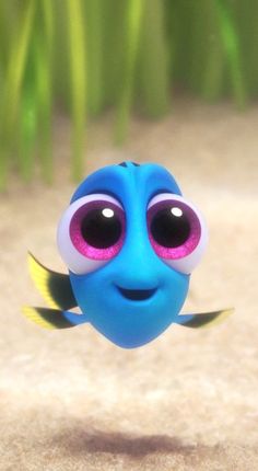 an image of a blue fish with big eyes and the words just keep swimming above it