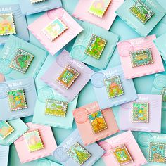 many different colored stamps are on top of each other in this photo, and there is no image here to provide a caption for