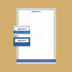 a letterhead and business card with the company's logo on it, sitting next to each other