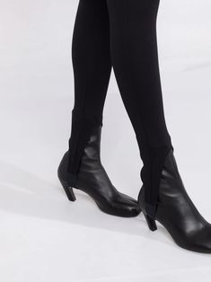 Black high-neck stirrup leggings from Wardrobe.NYC featuring stirrup cuffs, high waist and stretch-design. This item is in size L and the color is Chic High-cut Leg Elastane Leggings, Chic High Stretch Elastane Leggings, Chic Tight High-cut Leggings, Fitted Leggings For Evening In Fall, Fitted Evening Leggings For Fall, Sleek Fitted High-cut Leggings, Elegant High Stretch Elastane Leggings, Elegant Fitted Winter Leggings, Elegant High-stretch High-cut Leggings