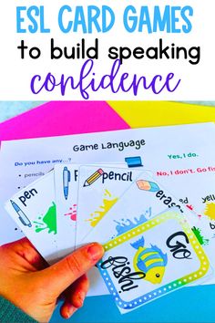 a hand holding cards that say esl card games to build speaking confidinence