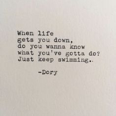 an old typewriter with the words, when life gets you down, do you wanna know what you've gota do? just keep swimming