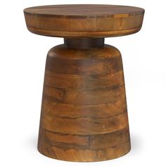 a small wooden stool sitting on top of a white floor