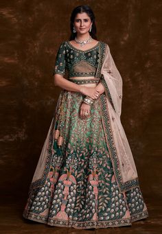 Green art silk a line lehenga choli 75015  Desc:  Style : A Line Lehenga Choli Color : Green Fabric : Art Silk Work : Embroidery Wash Care : Dry clean Sleeve Style : Half Sleeve Long Sleeves : Done only in Custom Stitch Sleeves Lining : Done only in Custom Stitch Bust Size : 32 to 42 Inches Occasion : Wedding   Mehendi   Sangeet   Engagement   Reception   Ceremonial   Baby Shower   Teej. With Express Free Shipping and Custom Stitching, Buy Lehenga - Indian Party wedding and bridal  Green art sil Umbrella Lehenga, A Line Lehenga, Party Wear Lehenga Choli, Green Lehenga, Lehenga Online, Lehenga Choli Online, Traditional Indian Outfits, Wedding Saree Indian, Bridal Lehenga Choli