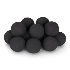 a pile of black balls sitting on top of each other