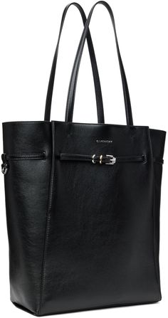 Grained calfskin tote in black. · Fixed carry handles · Logo stamp at face · Drawstring pin-buckle strap · Suede lining · Logo-engraved silver-tone hardware · H14.5 x W11.5 x D4.5 Supplier color: Black Givenchy Logo, Bags Logo, Givenchy Women, Silver Engraving, Medium Tote, Black Tote, Logo Stamp, Black Tote Bag, Leather Tote Bag