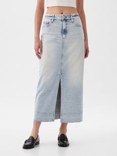 Fit: A denim midi skirt that's fitted at the waist.  Fabric: 94% Cotton, 5% Recycled Materials, 1% Stretch.  Stretch: Low Stretch Jeans.  Feels like vintage denim with a hint of stretch.  Snug at first & holds you in, but forms to your shape. ​ Look: A classic denim midi in a light indigo wash.  Details: Zip fly, five-pocket styling, & let-down raw hem.  Responsibly Made: This skirt is part of our water-saving Washwell program.  Compared to conventional wash methods, Washwell has saved millions Utility Skirt, Lace Midi Skirt, Black Pleated Skirt, Knit Midi Skirt, Denim Maxi, Work Skirts, Denim Maxi Skirt, Cargo Skirt, Denim Midi Skirt