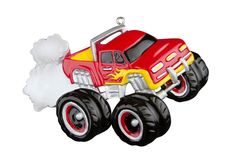 a red and yellow monster truck ornament on a white background