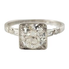 an antique style diamond engagement ring