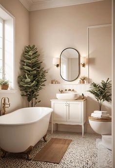 a white bath tub sitting under a bathroom mirror