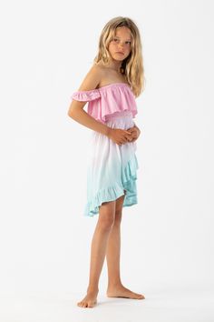 The Kids Daisy Dress was created with family adventure in mind. The bodice of this dress is adorned with intricate ruffle trim, adding dimension and movement to the top while cascading into a high-low hemline. The ruffle trim creates a charming and whimsical effect, perfect for matching with Mom in this all new style for the season. Details: 100% Rayon Hand Wash in Cold Water and Lay Flat to Dry Features: Unlined, Smocked bodice, Ruffle fabric overlay, Off the shoulder flutter sleeves, High-low Jumpsuit For Kids, Ruffle Fabric, Daisy Dress, Maxi Dress Sale, Rainbow Dress, With Mom, Crop Top Blouse, Family Adventure, Scrunchie Hairstyles