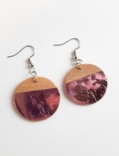 Wooden circle earring accented with pink foil texture.  Finished with silver findings. Festive Pink Round Earrings, Handmade Pink Circle Earrings, Everyday Hand Painted Pink Earrings, Playful Pink Round Earrings, Brown Wooden Round Earrings, Foil Texture, Wooden Circle, Pink Foil, Circle Earrings