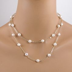 Lovely long pearl station necklace, also known as a tin cup necklace, made with 9-9.5mm white freshwater pearls and 14k gold filled chain. Each pearl is individually hand wrapped onto the chain. The necklace is 36 inches (91.44cm) long with a 14k gold filled lobster clasp. The necklace can be worn as one long strand or can be wrapped around and doubled for a layered look. The necklace will arrive in an attractive gift box. This necklace available with sterling silver chain here. White Pearl Gold Necklace, Small Pearl Necklace, Teardrop Pearl Earrings, Tin Cup, Dainty Pearl Necklace, Girlfriend Jewelry, Single Pearl Necklace, Pearl Necklace Designs, Pearl Jewelry Wedding