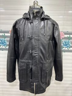 Elevate your winter style with this Men's Genuine Leather Hooded Long Jacket from Zayn Leather 🧥🖤 Perfect for various occasions like travel, workwear, and parties! Handmade with premium stitching and a soft polyester lining for extra comfort. #WinterFashion #LeatherJacket #Handmade #ZaynLeather #StayWarm  #eBay #eBayStore #eBaySeller #Motorcycle #Modern #Classic #Designer #City #Halloween #Festival #American #Rock #Outdoor #Retro #Western #Biker Leather Outerwear For Cold Weather, Black Outerwear With Storm Flap For Fall, Black Hunting Outerwear For Fall, Leather Hooded Jacket For Outdoor Fall Use, Hooded Leather Outerwear For Cold Weather, Black Outerwear For Hunting In Fall, Black Outerwear For Fall Hunting, Outdoor Leather Jacket With Detachable Hood, Classic Hooded Parka For Cold Weather