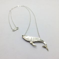 Silver whale necklace, sterling silver humpback whale pendant with 20 inch chain Infinite Jewelry, Adjustable Silver Necklace With Ocean-inspired Style, Whale Accessories, Whale Craft, Beluga Whale Jewelry, Jewelers Saw, Whale Pendant Necklace, Whale Pendant, Whale Tail Pendant