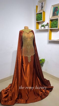 luxury burnt orange dress Burnt Orange Prom Dress, Luxury Prom Dress, Orange Prom Dress, African Prom Dress, Forest Green Wedding, Orange Gown, Detachable Cape, Orange Prom Dresses, Green Wedding Dresses