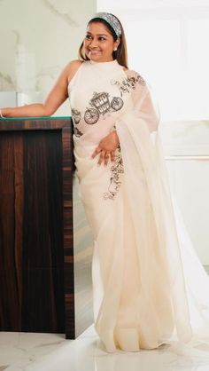 Dolly Jain 🇮🇳 on Instagram: "#SAREELS 419 I have worn many hand-painted sarees in the past, but this particular saree is truly unique.  This saree features full hand-painted cartoon characters on my all-time favorite organza saree , in the perfect combination of ivory and black.  As soon as I saw this saree, it took me back to my childhood when we had limited television channels and cherished every moment of watching cartoon films. Creating memories with these characters was so much fun. When I wore  this saree, it felt  like I’ve transformed into one of those characters.  Now, let me tell you about the talented artist behind this masterpiece. Her name is Neha, and I have known her for almost 10 years. I have witnessed her create fabulous designs on paper, but her new venture is absolute Organza Saree Blouse Designs, Hand Painted Sarees, Cherish Every Moment, Watch Cartoons, Creating Memories, Elegant Saree, Organza Saree