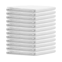 a stack of white sheets sitting on top of each other in front of a white background