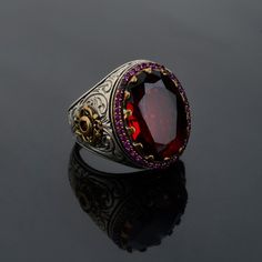 We designed this unique red zircon stone design for you and produced it carefully. This ring will be an unforgettable, stylish and useful gift to your loved ones. We package the ring in a way that is suitable for gifting. -Item Details - Gender : Male / Female - Materials: 925K Sterling Silver - weight: 12-18 gr * Ready to Ship in 1-3 Business Days * The product is sent with a suitable box for gifting. *visit our store for unique unique jewelry and the most advantageous prices Please feel free t Luxury Red Ruby Gemstone Ring, Luxury Ruby Rings With Gemstone Accents, Luxury Red Gemstone Ring, Luxury Red Ruby Ring With Gemstone Accents, Luxury Red Sapphire Ring, Luxury Red Ruby Ring With Accent Stones, Red Gemstone Accented Round Rings, Luxury Garnet Gemstone Rings, Luxury Red Sapphire Ring With Accent Stones