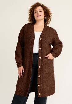 Wrap yourself in comfort with our midi-length cardigan. This versatile layer adds warmth and style to any outfit.Wear it as a dress or layered over bottoms.        Button-down closure. Two front patch pockets. Ribbed cuffs.  39" lengthPoly/Nylon/Acrylic/WoolMachine wash Imported Cardigan With Buttons, Thermal Sweater, Womens Scrubs, Sweater Collection, Swimsuits For All, Oversized Cardigan, Winter Clothes, New Tops, Rain Wear