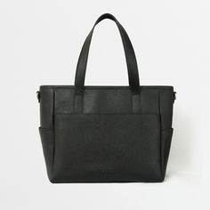 This structured tote is the ultimate do-it-all bag that you deserve. It's the perfect carryall for work, travel, and anywhere your day brings you. It features a spacious and organized interior for your essentials, a padded compartment for your laptop, side pockets for your drinks, and you can convert it into a backpack or crossbody. Crafted from premium American Saffiano leather that's waterproof and scratch-resistant, the Transform Tote will stay just as beautiful through all your travels and a Concealed Carry Purse, Work Backpack, Laptop Tote, Luggage Straps, Best Bags, Work Bags, Backpack Straps, Work Bag, Black Tote