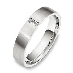 a white gold wedding ring with two diamonds