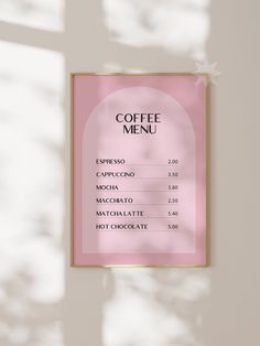 a coffee menu hanging on the wall