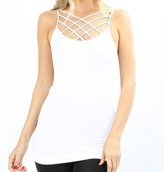 Our Criss Cross Cage Cami is the perfect piece that is sure to add tons of versatility to your collection! Wear this tank with your favorite jeans and baseball cap for a casual look! Also, try layering this tank with cardigans and jackets for the perfect spring look! Also try stack layering the camis for a unique look. SIZE CHART All measurements are in inches, unstretched to a comfort stretch. Size S/M L/XL 1X/2X 2X/3X Bust 28-36" 30-38" 33-43" 35-45" Hip 28-36" 30-38" 33-43" 35-45" Length 27.5 Edgy Strappy Tops For Summer, Spring Crisscross Strap Tank Top, Edgy Spring Tank Top, Trendy Tank Top With Crisscross Straps, Casual Summer Crisscross Tank Top, Edgy Tank Top With Tank Straps For Spring, Casual Summer Tank Top With Crisscross Back, Casual Crisscross Tank Top For Summer, Trendy Spring Crisscross Tops