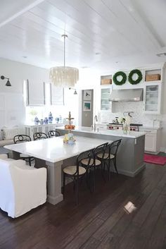 the kitchen is clean and ready to be used for dinner or other entertaining purposes in someone's home