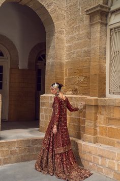 Pakistani Bridal Dress in Red Lehenga and Kameez Style is embellished with the hand-crafted details of zardosi, dabka, and motifs. Perfect stitching and premium quality fabric make this Lehenga Dress an epitome of beauty and your foremost priority for the wedding. Lehenga Kameez: The stunning kameez in an alluring red color is beautifully embellished with the intricate zardosi, dabka, resham french knots, threads, motifs, dabka, naqshi, zari, and sequins. Premium quality khaadi net fabric, kamdaani work, and perfect stitching make this Pakistani Bridal Dress a perfect choice to have a gorgeous wedding look. Red Lehenga: The embellished kameez is paired with Bridal Lehenga, creating a lavish Pakistani Bridal Outfit. The Farshi Lehenga has an alluring red shade and is gracefully emblazoned w Pakistani Bridal Wear Red, Farshi Lehenga, Pakistani Bridal Red, Red Pakistani Bridal Dress, Lehenga Kameez, Kameez Style, Bridal Lehenga Pakistani, Pakistani Bridal Lehenga, Nikah Outfit