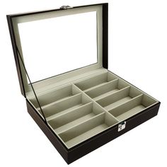 an open black leather jewelry box with six compartments and two dividers on the inside