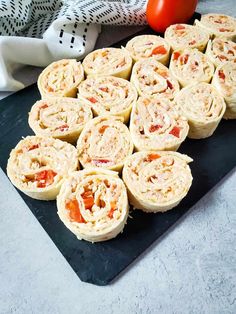 there are many rolls on the cutting board