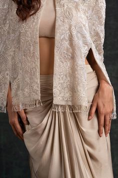 Beige organza cape with 3D floral, beads and sequins embroidery. Comes with a satin draped skirt and a padded blouse. - Aza Fashions Beads And Sequins Embroidery, Organza Cape, Cape Skirt, Padded Blouse, Beige Jacket, Draped Skirt, Beaded Neckline, Sequins Embroidery, Skirt Pattern