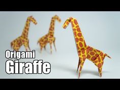 three giraffes made out of paper on a white background with the words origami giraffe