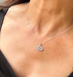 "EVIL EYE NECKLACE 🧿 -Unique Necklace -Handmade -Sterling Silver 925 -Zircon This impressive evil eye necklace is perfect to wear everyday! It is also ideal for a gift to yourself or to protect someone you love! 💕 > MATERIALS     Gold 18K,14K,12K     Sterling Silver 925  > RING SIZE    All my rings are US standard size,in case you do now know whats your ring size you could also go to your local jewelry store to measure     your finger size to get your correct ring size. Please contact me for the ring size details before placing the order.  > PACKAGING    All of our products are beautifully packaged for gifts in a jewelry box.    All of our engagement rings are packaged in PREMIUM jewelry boxes for free. > ADDITIONAL SERVICE    Engraving Service    All sizes    Costum order    > Custom Or Silver Pendant Necklace With Diamond Eyes, Blue Sterling Silver Jewelry With Diamond Eyes, White Gold Evil Eye Necklace Gift, Blue Sterling Silver Necklace With Diamond Eyes, Silver Evil Eye Necklace In Fine Jewelry Style, Silver Evil Eye Fine Jewelry Necklace, Elegant Silver Evil Eye Charm Necklace, Elegant Silver Necklace With Diamond Eyes, Elegant Silver Evil Eye Jewelry