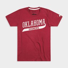 While this doubles as a classic, ‘90s-era Sooners design, Oklahoma diehards recognize this wordmark from their baseball uniforms in 1994. That year, of course, the Sooners won their second national championship as the No. 4 seed in the College World Series. Oklahoma survived the gauntlet, eventually defeating Georgia Tech for the title. Products are mocked up on a size S. Graphics may appear smaller on larger sizes. Throwback Cotton T-shirt With Team Logo, Varsity Logo Print T-shirt For Game Day, Throwback Team Tops For Sports Events, Throwback Sports Team Tops, Collegiate T-shirt With University Logo For Game Day, University Red Collegiate T-shirt With Letter Print, Cotton Varsity T-shirt With Lettering, Casual T-shirt With Lettering For Game Day, Throwback Team Name T-shirt For Fan Gear