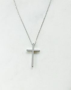 "Silver cross necklace, cross necklace, religious necklace cross, religious gift, simple cross necklace, silver necklace, religious gifts women Simple and elegant shiny silver plated cross necklace. D E T A I L S: * Silver plated cross pendant charm 13mm x 23mm * Silver plated chain *Lobster clasp closure *Shown at 18\" length SHIPPING: *Free domestic shipping on all orders PACKAGING: *All pieces come beautifully packaged, perfect for gift giving. Find more to ❤️ here: http://etsy.com/shop/theje Minimalist Daily Wear Cross Pendant Necklace, Minimalist Everyday Cross Necklace, Everyday Minimalist Cross Pendant Necklace, Minimalist Cross Pendant Necklace For Everyday, Minimalist Cross Necklace For Everyday, Minimalist Cross Pendant Necklace For Everyday Wear, Everyday Silver Cross Pendant Necklace, Minimalist Silver Cross Necklace, Simple Everyday Cross Necklace