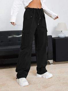 Effortlessly embodying the spirit of contemporary fashion, these Drawstring Waist Plain Parachute Pants are an exquisite blend of comfort and elegance. Crafted with meticulous attention to detail, these pants boast a sophisticated silhouette that effortlessly elevates any ensemble. The absence of embellishments and patterns lends a timeless appeal, making them a staple piece in any discerning fashion enthusiast's wardrobe. Specifications: Style: Casual Pattern Type: Plain Type: Parachute Pants C Black Drawstring Wide-leg Pants, Black Wide Leg Drawstring Pants, Black Wide-leg Pants With Drawstring, Black Drawstring Pants For Work, Elegant Wide-leg Pants With Cargo Pockets, Chic Black Pants With Drawstring, Chic Black Drawstring Pants, Trendy Denim, Casual Denim