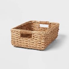 a wicker basket with two handles