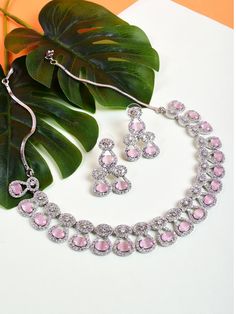 Hey, Welcome to our shop! Handmade necklace with brilliant AAA grade cubic zirconia or American diamonds and premium silver plating, set in an elegant design.  < 1 DAY ITEM SHIPMENT | 7-8 Days Delivery TIME> About our Jewellery - Classic, Brilliant & Elegant. We deal in all type of Premium Indian Bollywood Jewellery. * AD Jewelry set * Kundan Necklace * Polki Jewellery * Uncut Jewellery * AD Ring * AD Bangles * AD Pendant Set * Pachi Kundan & many more.. * All our products are made with high-quality stones, the intricate texture and design makes it a must-have for every modern woman. 100% Brand New & 100% High Quality All jewelry Sets & Other Product Material : Cubic zirconia Plating : Silver Plated Package include: 1 Necklace 1 Earring Set Occasions: parties, gifts, daily life, parties, d Silver Crystal Bridal Necklace With Stones, Silver Bridal Necklace With Crystal Stones, Silver Cubic Zirconia Necklace With Stones, Silver Rhinestone Wedding Necklace, Silver Jewelry Sets With Rhinestones, Silver Necklaces With Sparkling American Diamonds, Silver Diamond Bridal Necklace With Stones, Elegant Pink Rhinestone Necklace In Cubic Zirconia, Round Cubic Zirconia Jewelry Sets With Rhinestones