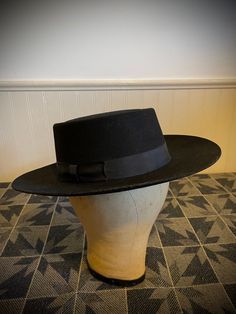 "Authentic Black Pork Pie Hat of 100% Genuine Wool Left in nice vintage condition. This hat measures 21\" inside band - 2 3/4\" brim. WPL USA size Medium" Classic Black Hat With Flat Crown, Vintage Fitted Felt Hat For Fall, Black Top Hat For Kentucky Derby With Flat Crown, Black Top Hat With Flat Crown For Kentucky Derby, Vintage Fitted Hat Bands For Rodeo, Fitted Wide Brim Top Hat For Country Events, Western Boater Hat With Flat Crown, Western Style Black Boater Hat With Flat Brim, Black Fedora With Flat Crown For Country Events