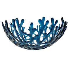 a blue bowl that is sitting on top of a table